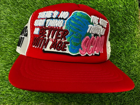 SCAM RED TRUCKER HAT
