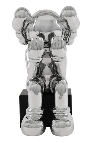 SILVER CHROME KAWS INSPIRED SITTING SCULPTURE