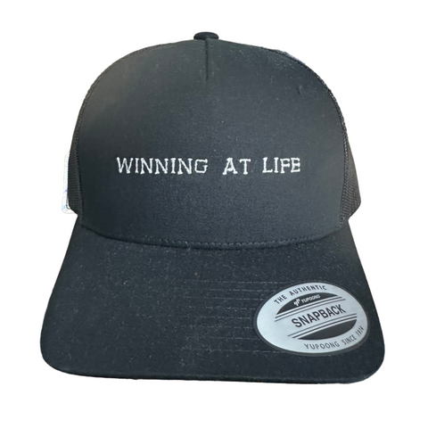 WINNING AT LIFE BLACK TUCKER HAT